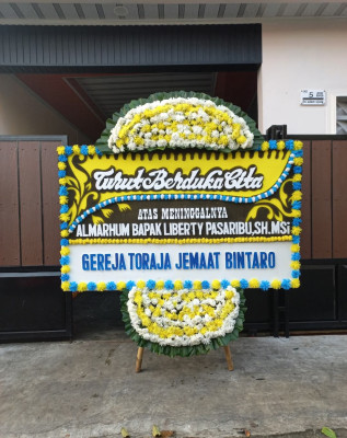 Papan Bunga Duka di Waibu