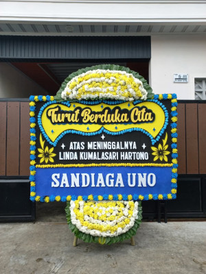 Papan Bunga Duka di Waibu